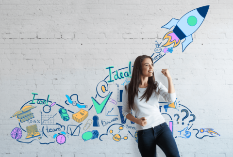Metro Hr - The power of coaching. Lady standing by graffiti art of rocket