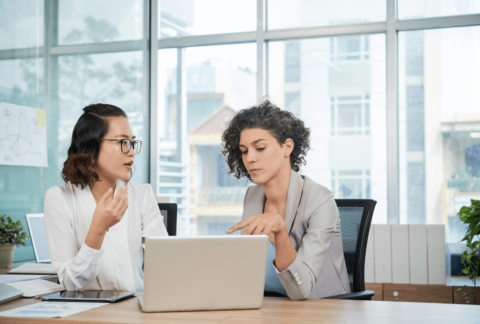 Mediation Or Facilitated Conversation - Two female colleagues