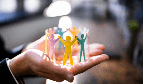 MetroHR_Employment Rights Act 2025 - Person holding paper chain employees gently