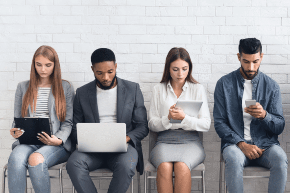 Multiple applicants for apprenticeship programme - sitting waiting for interview